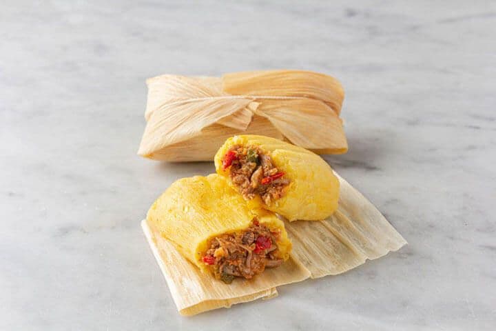 Porto's Cuban-style pork tamale in a corn husk